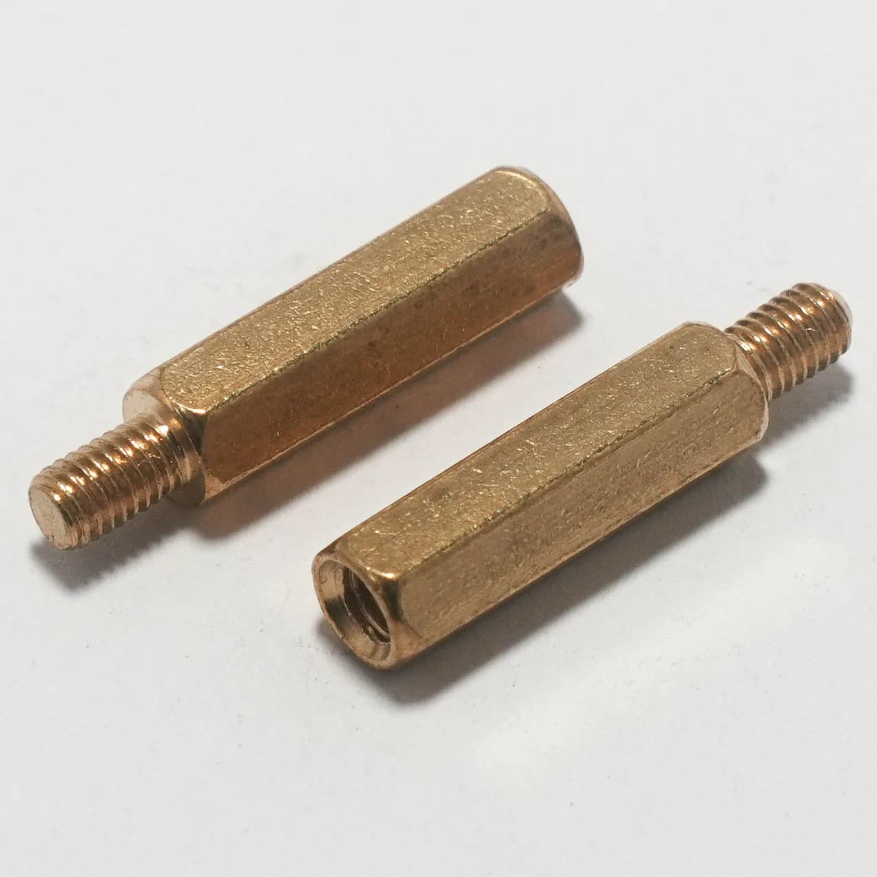 Brass hex male-female standoffs.