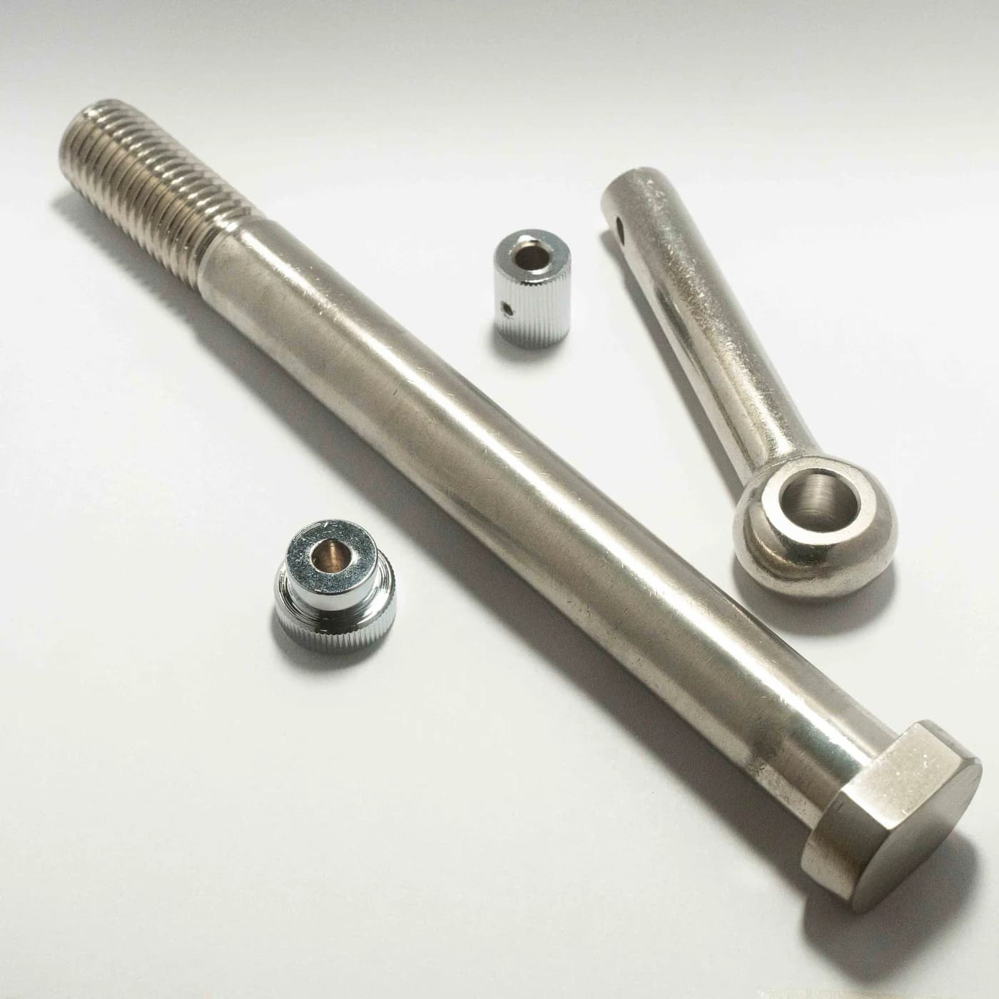 Custom eye-end shaft and mating fastener components